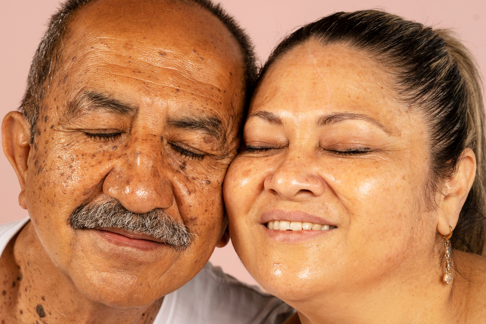Man and Woman with Glowing Skin 